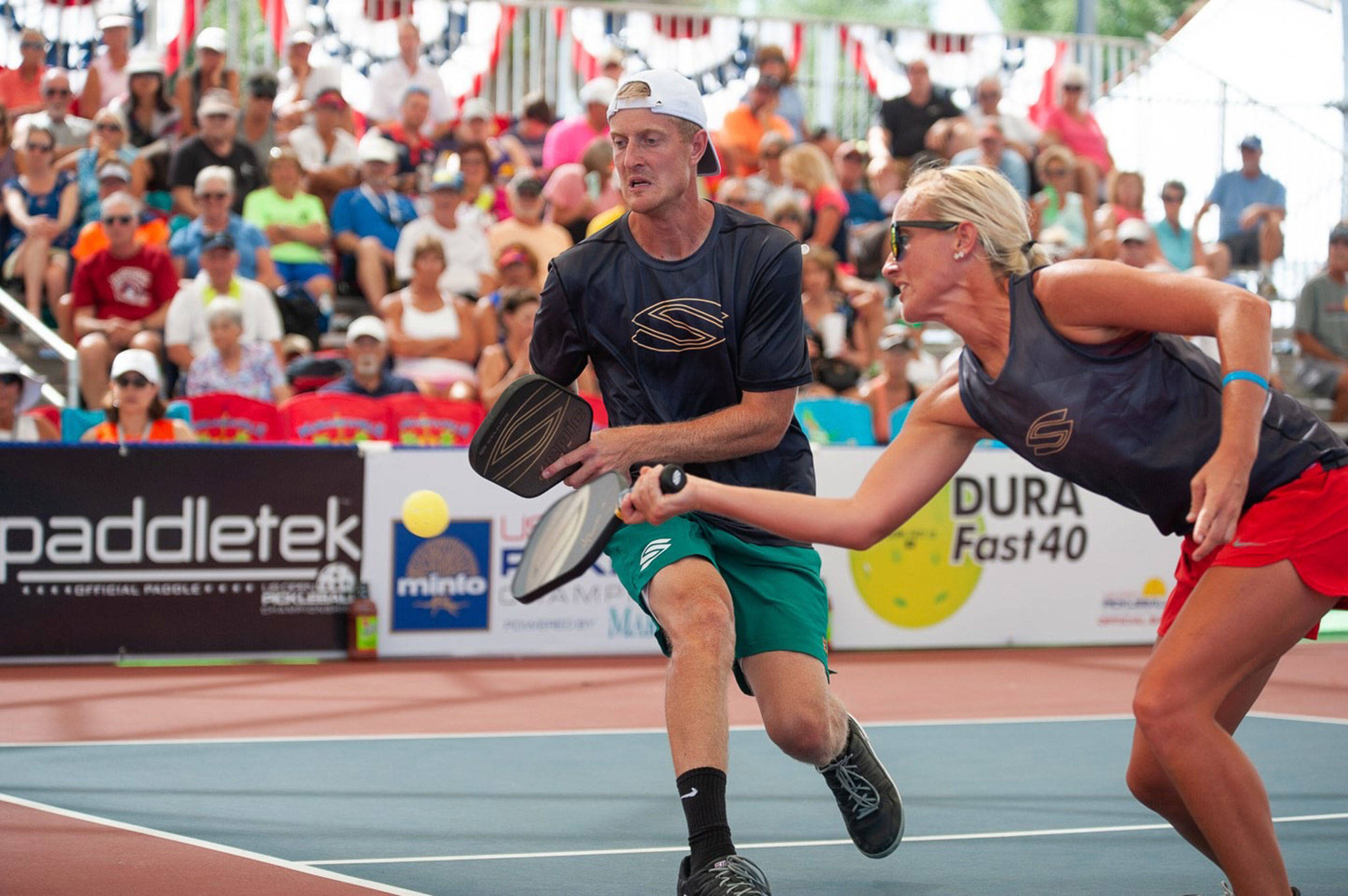 Siblings Riley, left, and Lindsey Newman compete in the bronze medal match at the U.S. Open in Florida in April. (Submitted photo)