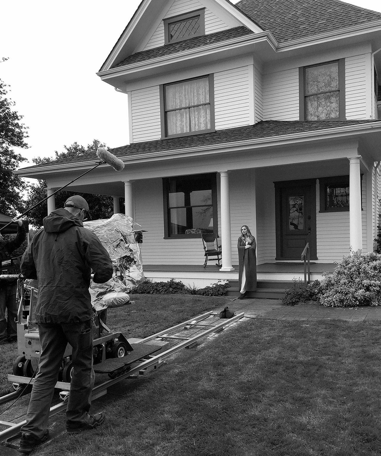 Photos provided                                Above, a crew shoots part of the movie “ECCO” at the Jenne Farm in Coupeville. The film was written and directed by Ben Medina, who was born on Whidbey Island. The spy thriller is set to release Aug. 9. Below, another still from the film.