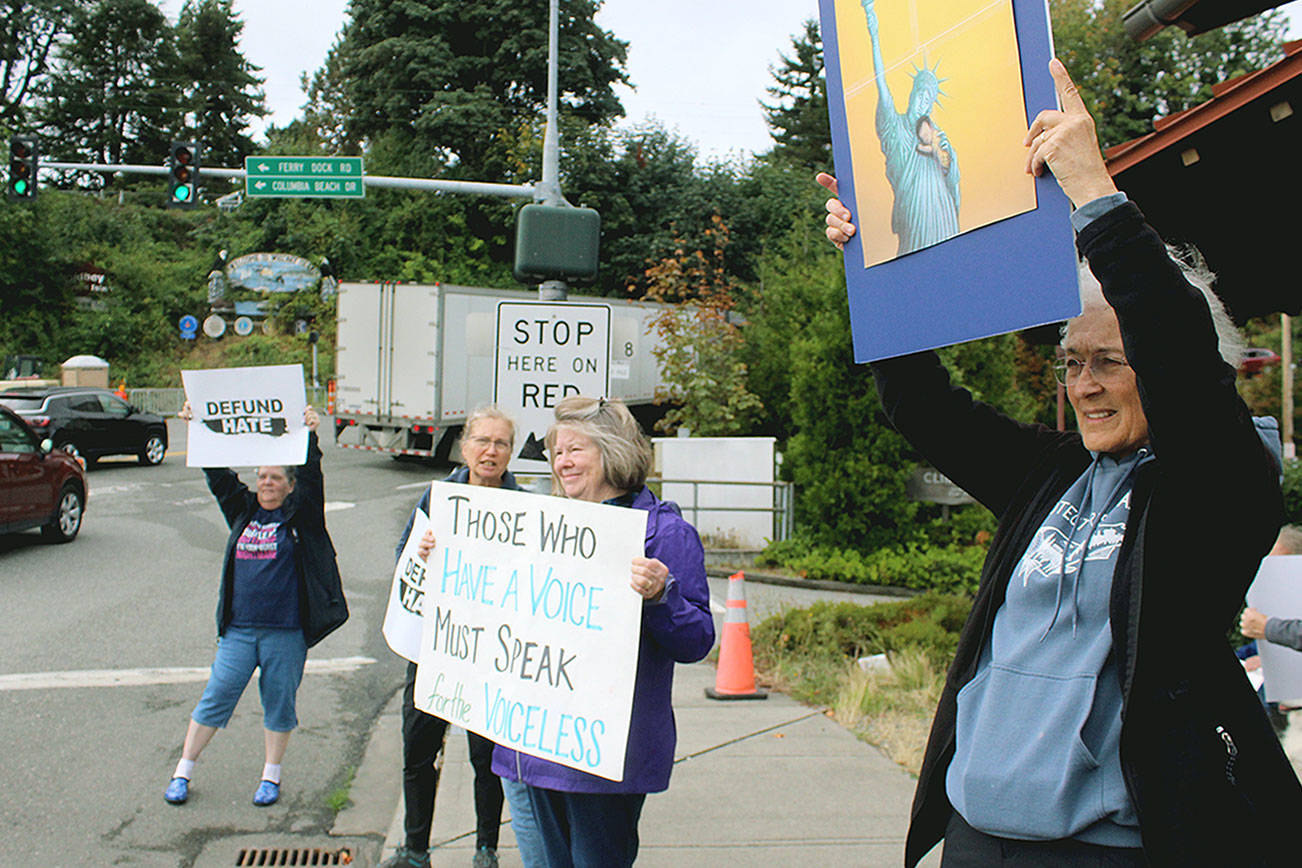 Whidbey Island Indivisible group joins banner march protesting immigration policy