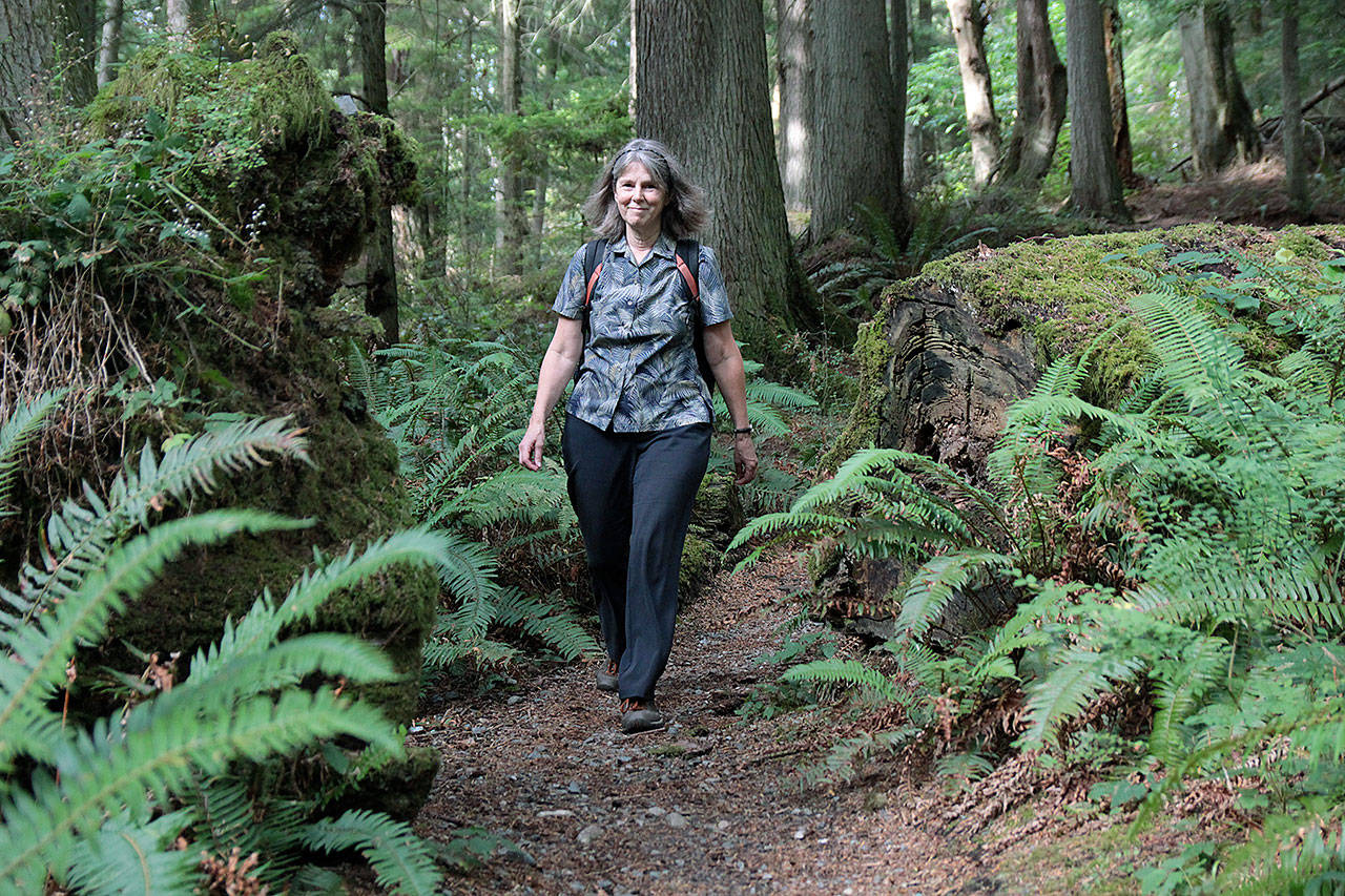 Maribeth Crandell walks a trail at South Whidbey State Park. The release party for her new book “Hiking Close to Home” will be held 4 p.m., Sept. 21 at Coupeville Library. Photos by Laura Guido/Whidbey News Group