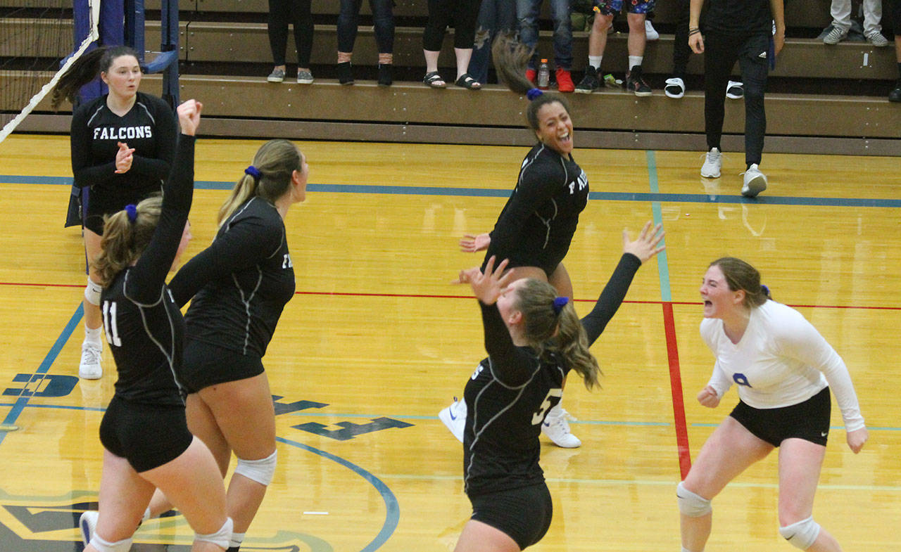 South Whidbey celebrates its win over Sultan Tuesday. Clockwise from the back left are Madi Knauer, Maya Tschetter, Kayla Knauer, Kamryn Wilson, Morgan Batchelor and Emma Hodson.(Photo by Jim Waller/South Whidbey Record)