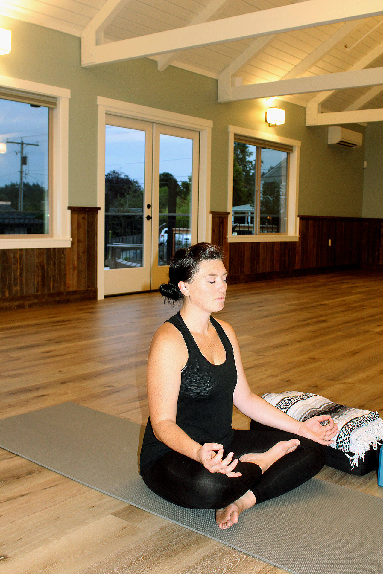 Alisha Walsh from Meaningful Movement Dance & Yoga meditates in her class space at Soundview Center. Photo by Wendy Leigh/South Whidbey Record