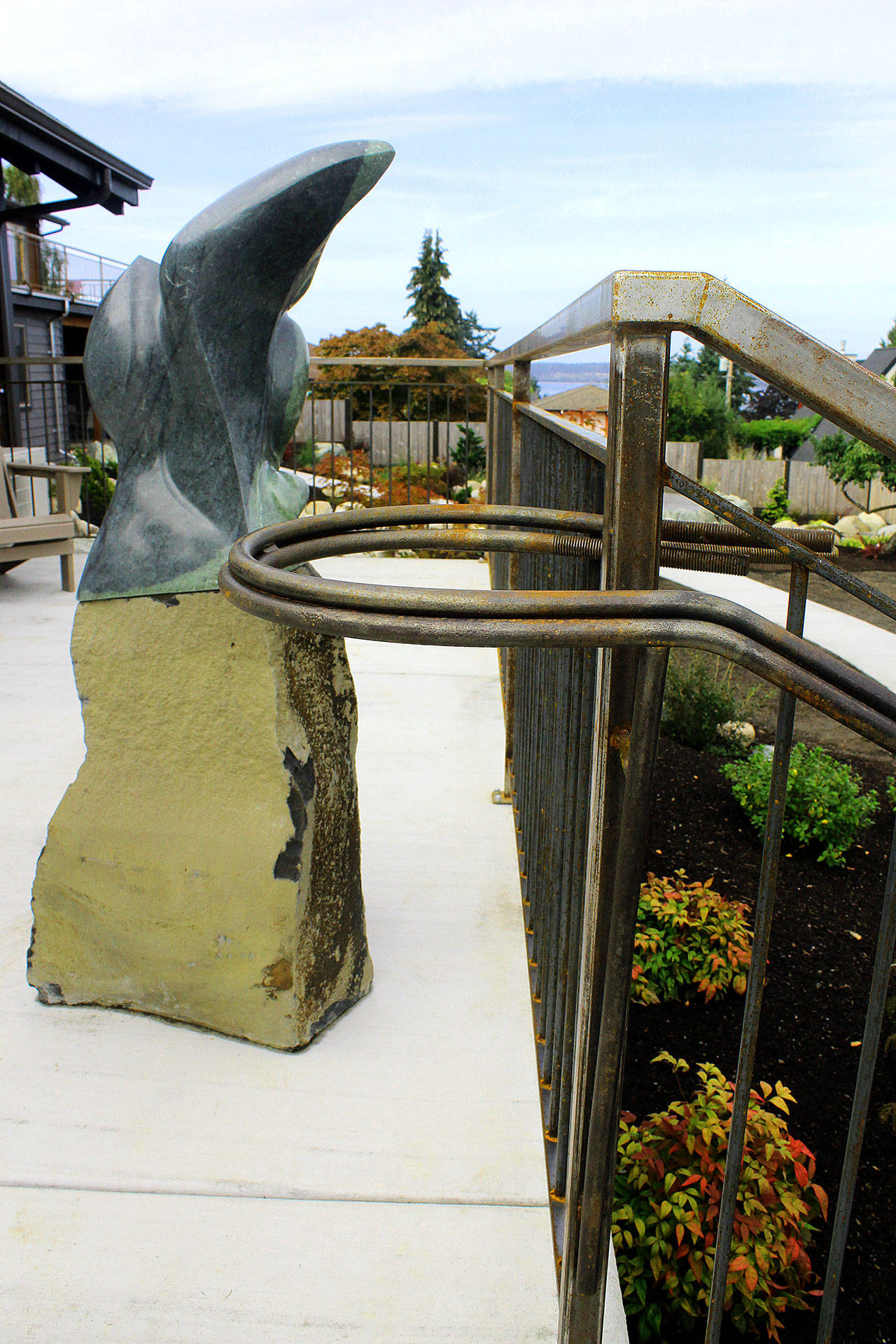 The “New Growth” sculpture by artist Sue Taves complements iron railings by Tim Leonard at the new Soundview Center in Langley. Photo by Wendy Leigh/South Whidbey Record