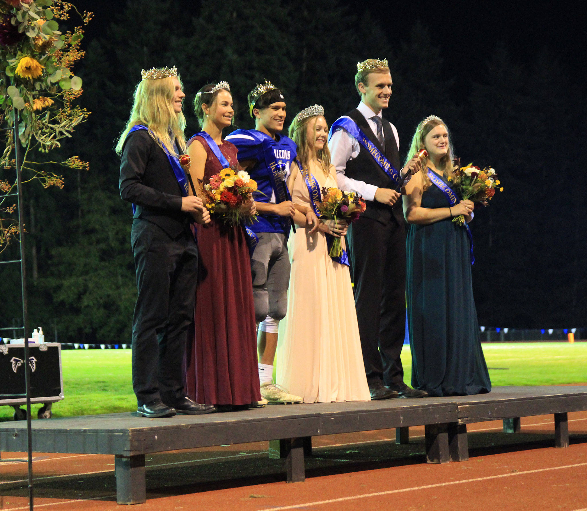 South Whidbey celebrated homecoming Friday. The royal court included Sam Baesler, left, Alison Papritz, King Alex Black, Queen Mallory Drye, Levi Buck and Oliana Stange.(Photo by Jim Waller/South Whidbey Record)
