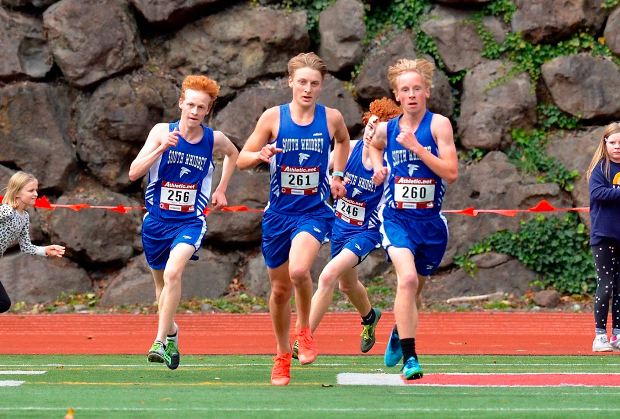 South Whidbey’s Reilly McVay, left, Cooper Ullmann, Aidan Donnelly and Thomas Simms head the the finish line in Thursday’s race at King’s. (Photo by Karen Swegler)