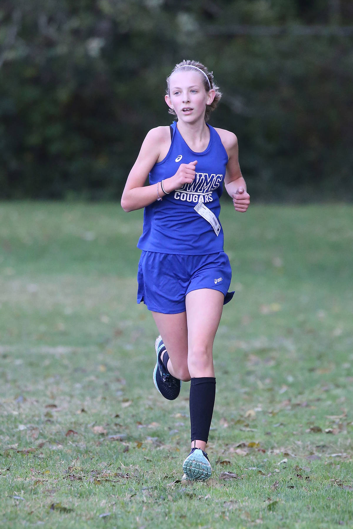 Audrey Gmerek recorded the highest finish, third, by a Cougar runner at the league championship meet Wednesday.(Photo by John Fisken)