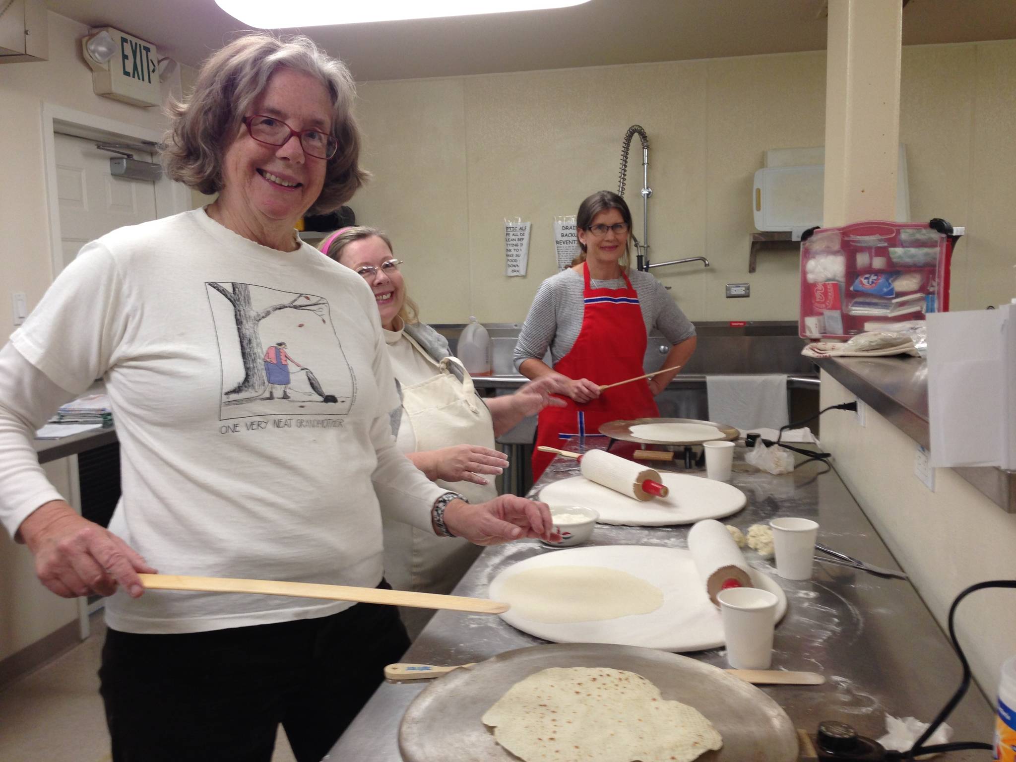 Photo submitted                                From left, Daughters of Norway members Kris Collins, Elizabeth Byszeski and Patricia Waterson prepare lefse.