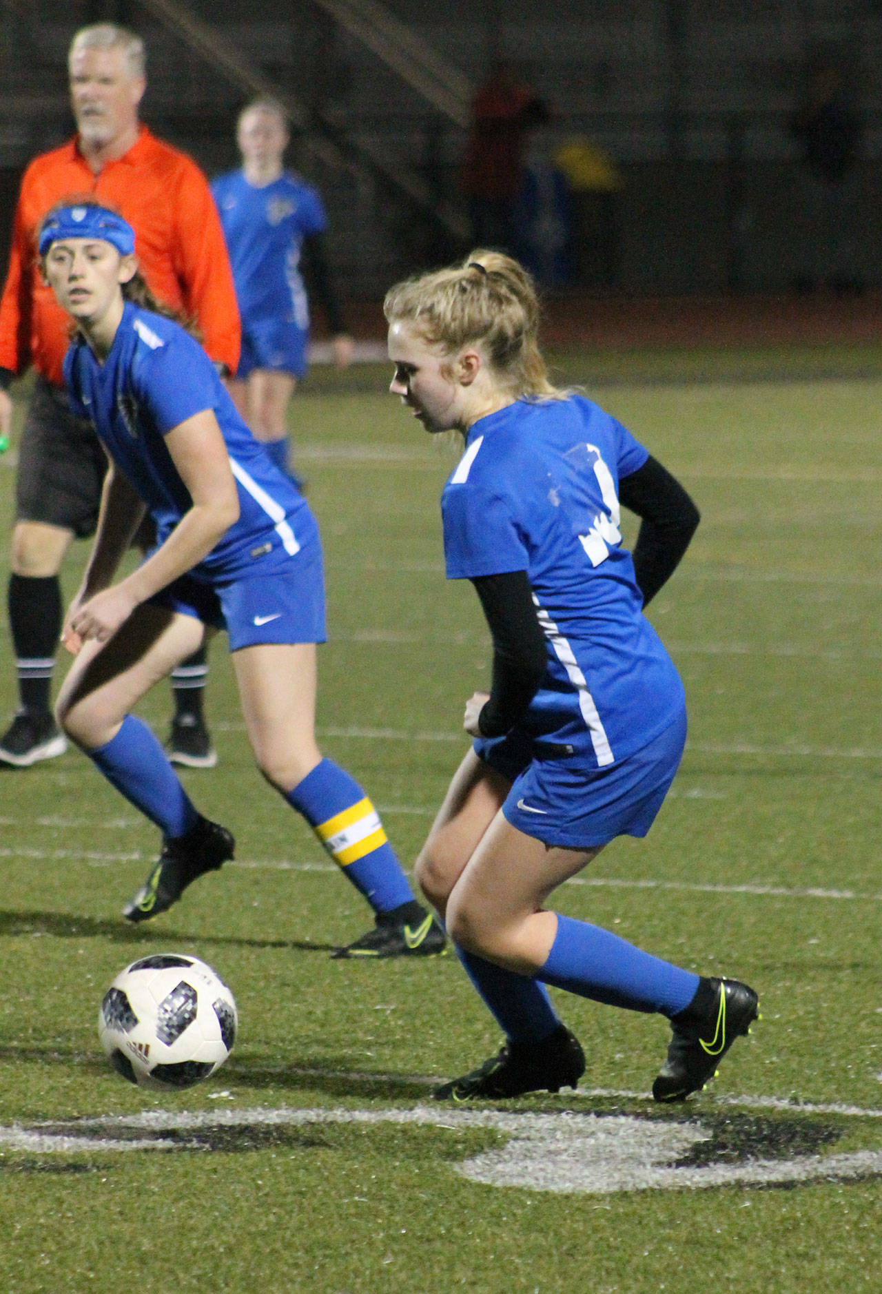 Mikenna Wicher sets up the final South Whidbey goal. Moments later she drilled her second goal of the night in the Falcons 4-0 win.(Photo by Jim Waller/South Whidbey Record)
