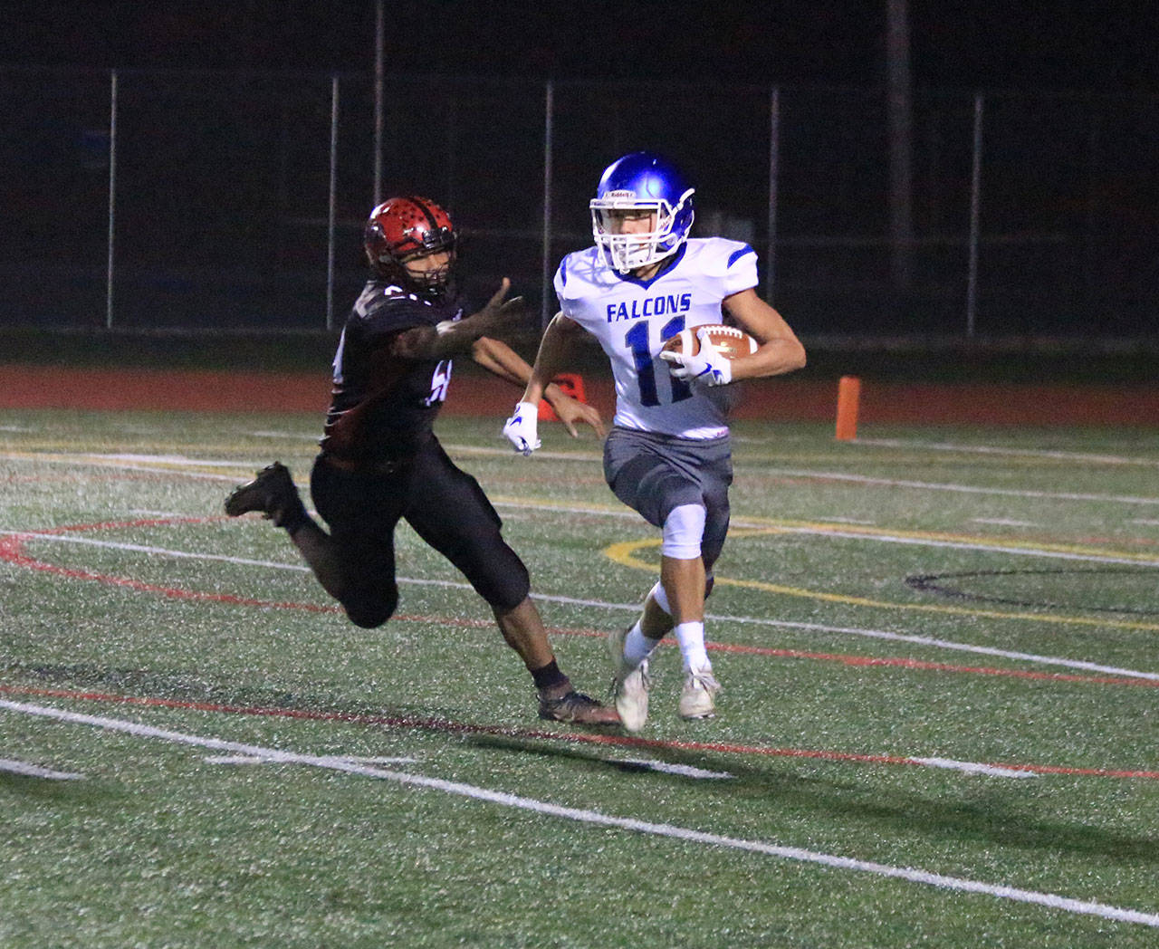 Alex Black returns a kickoff for South Whidbey. (Photo by Jim Waller/South Whidbey Record)