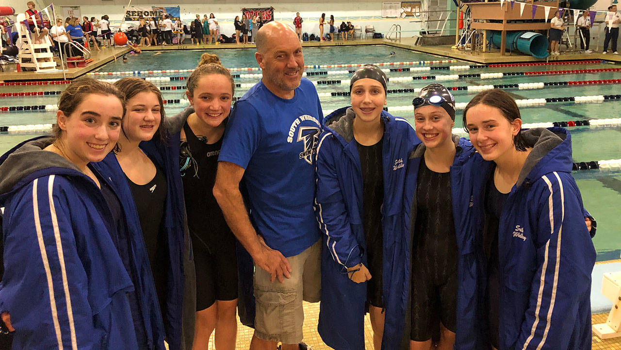 The South Whidbey High School swim team at the district meet: Katie Zundel, left, Devin King, Ashley Lynch, coach Chris Erickson, Abigail Ireland, Parker Forsyth and Sarah Zundel. (Provided photo)