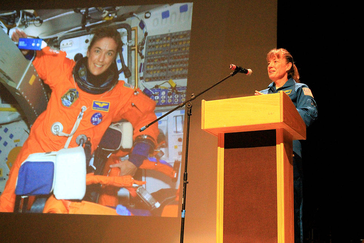 Photo by Kira Erickson / South Whidbey Record                                Capt. Heidemarie Stefanyshyn-Piper shows a picture of herself as an astronaut during a South Whidbey High School assembly last Wednesday.