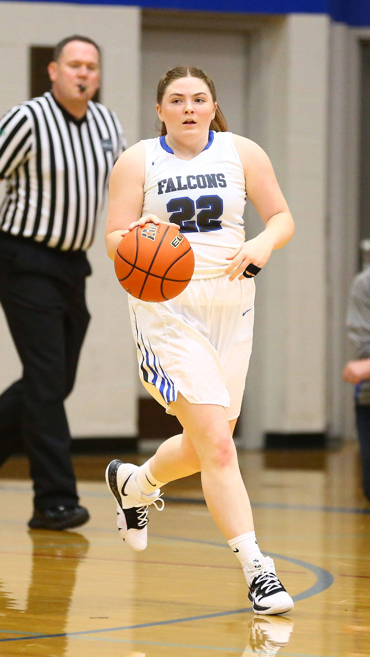 Point guard Kayla Knauer looks to set up the South Whidbey offense.(Photo by John Fisken)
