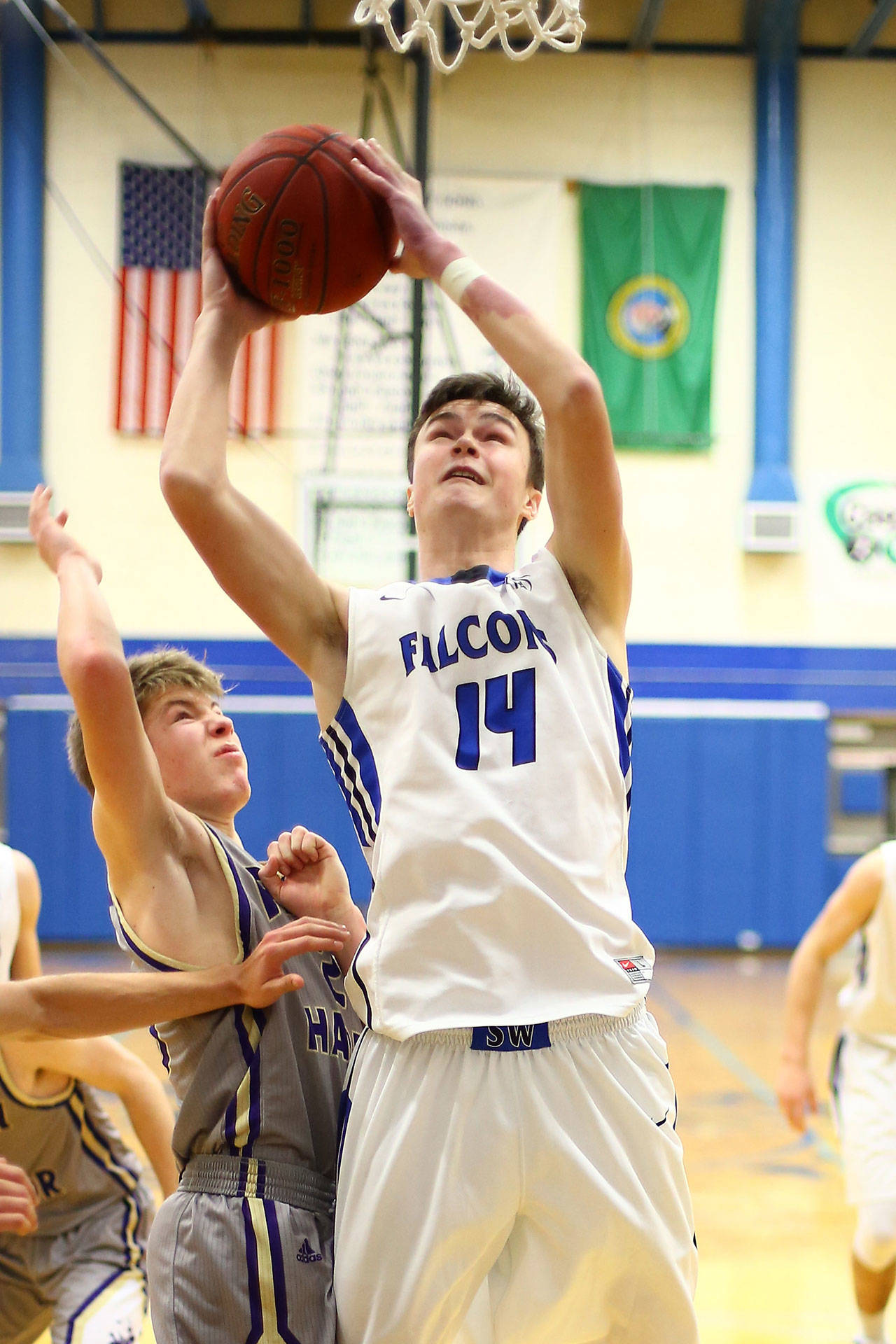 Brady Hezel (14) puts up a shot for South Whidbey.(Photo by John Fisken)