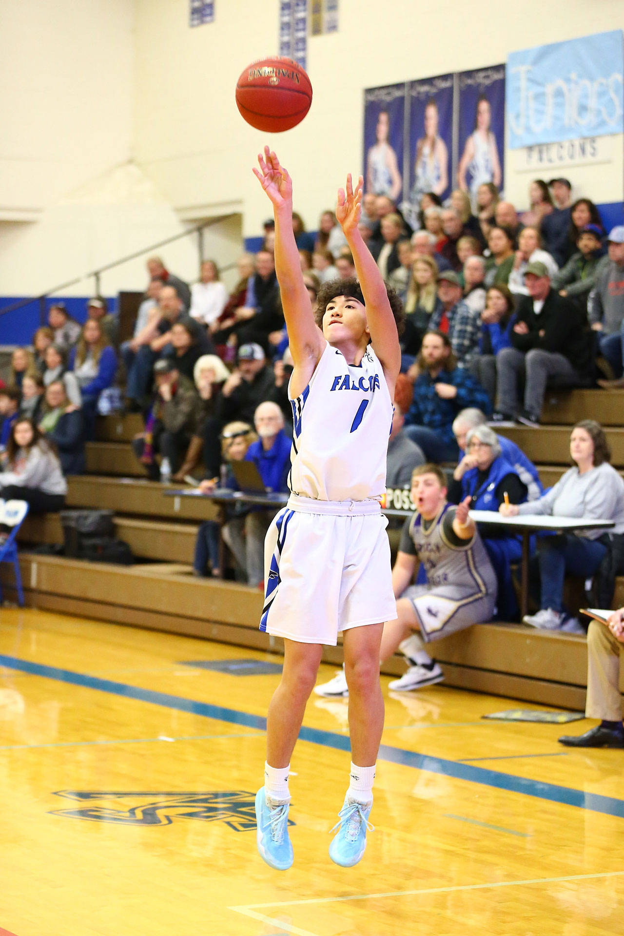 Jacob Ng fires up a three-pointer.(Photo by John Fisken)