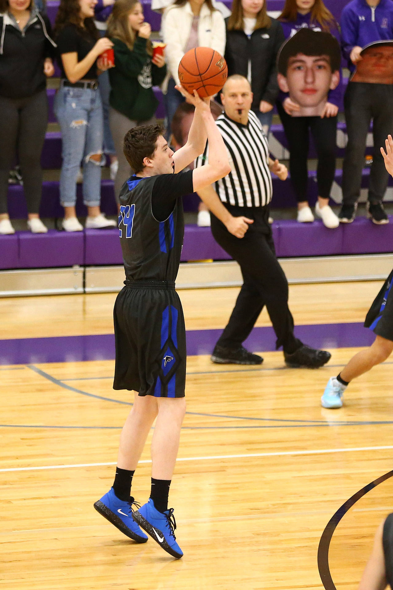 Sterling Patton launches a three-pointer.(Photo by John Fisken)