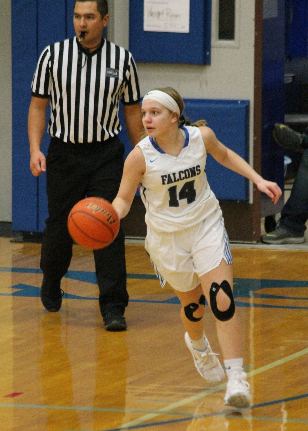 Zoey West hustles the ball up the court for South Whidbey.(Photo by Jim Waller/South Whidbey Record)