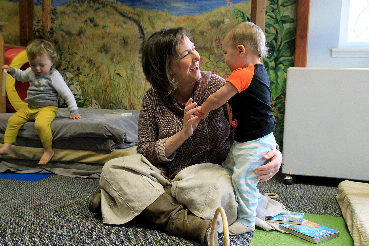 Photo by Kira Erickson/Whidbey News Group                                Executive Director Kris Barker with youngster Esme Tornga during playtime Jan. 6 at the South Whidbey Childrens Center.