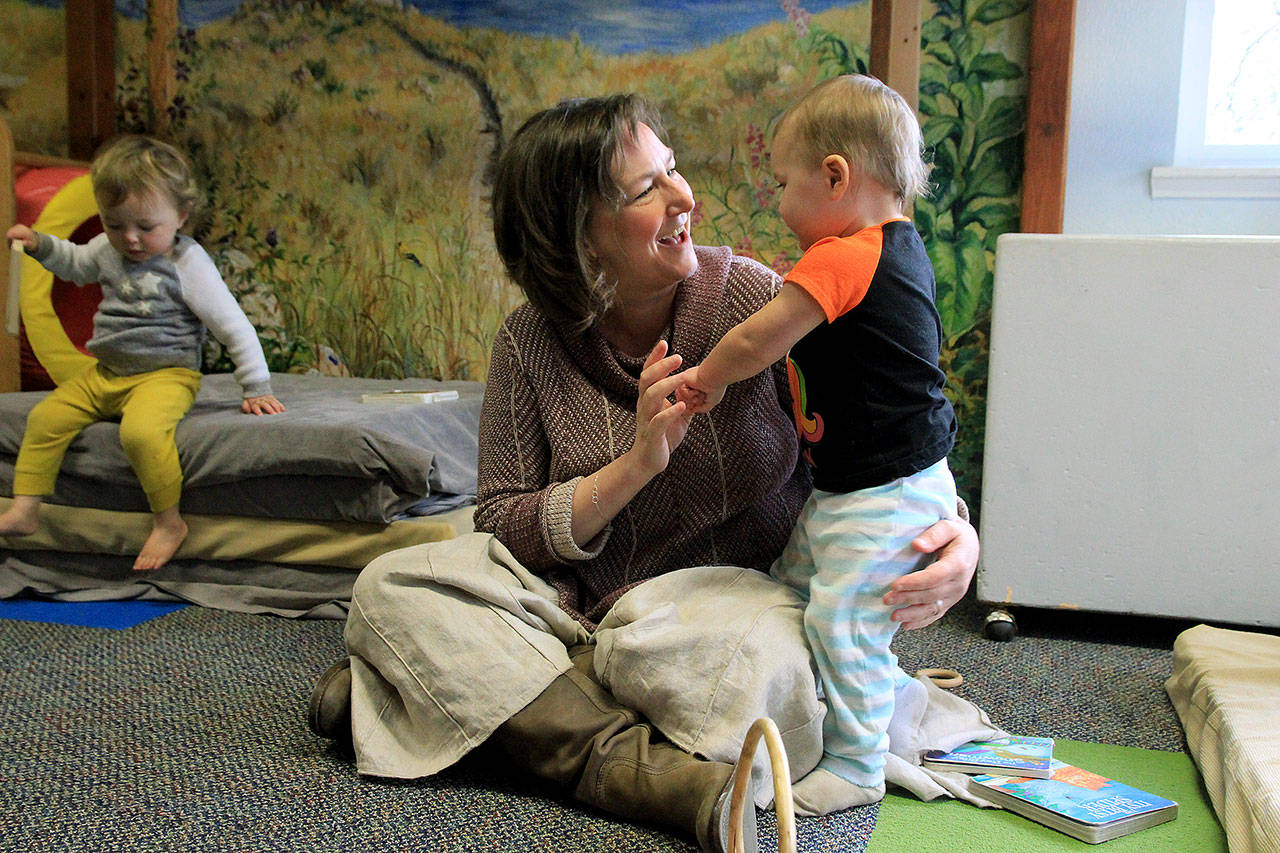 Photo by Kira Erickson/Whidbey News Group                                Executive Director Kris Barker with youngster Esme Tornga during playtime Jan. 6 at the South Whidbey Children’s Center.