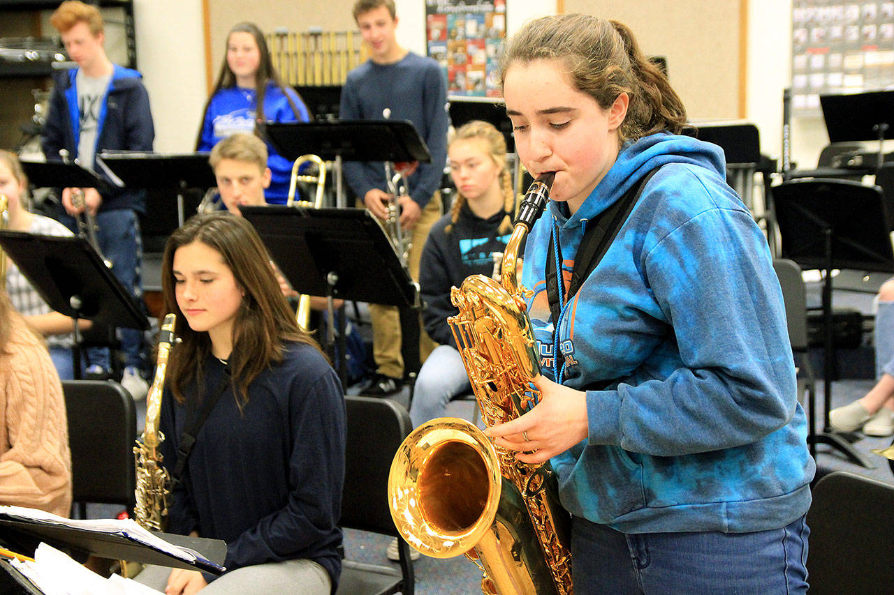 Photos by Kira Erickson / South Whidbey Record                                Junior Katherine Zundel plays the baritone saxophone during a jazz band practice session Jan. 16.