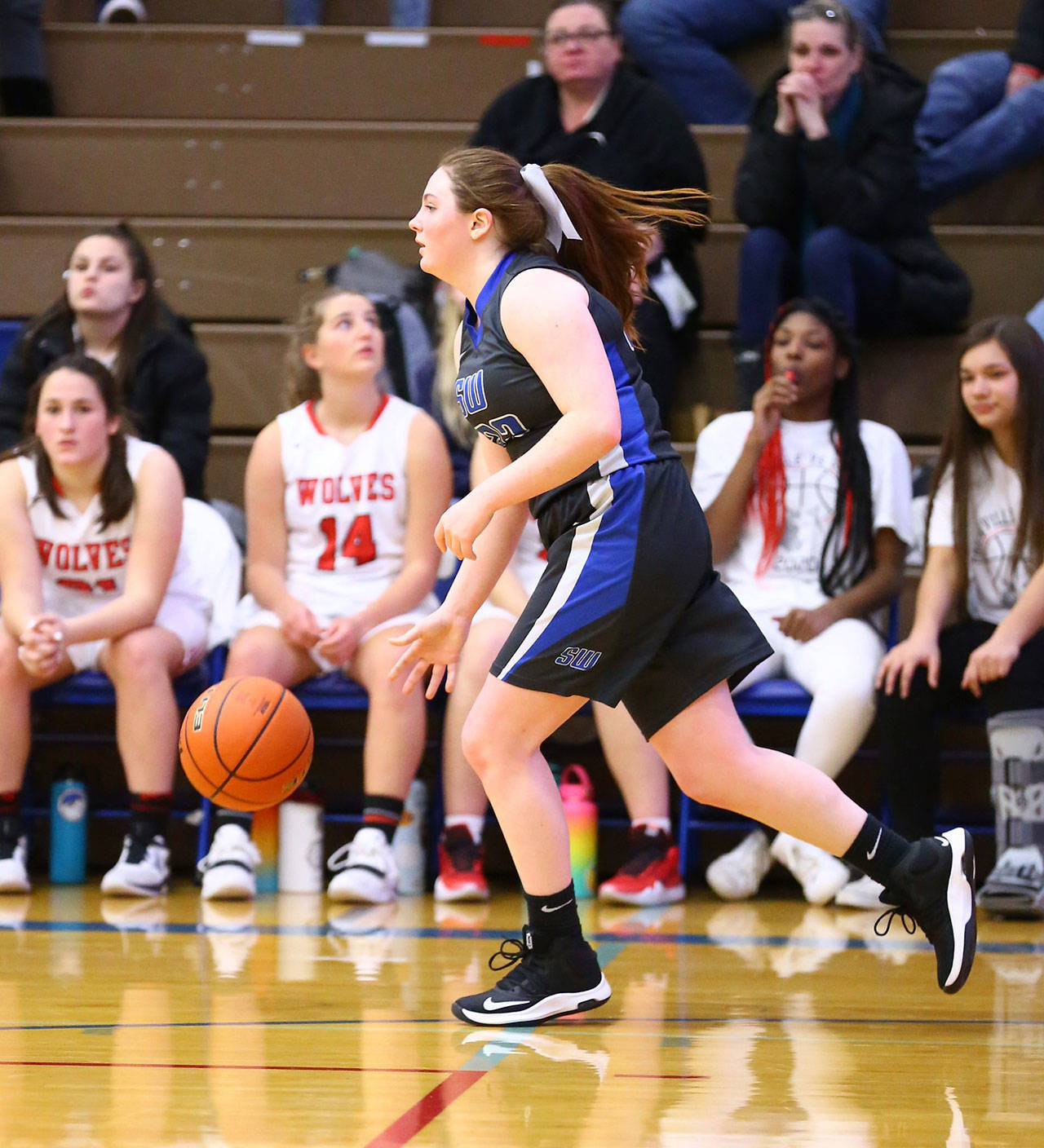 Point guard Kayla Knauer advances the ball in Friday’s game.(Photo by John Fisken)