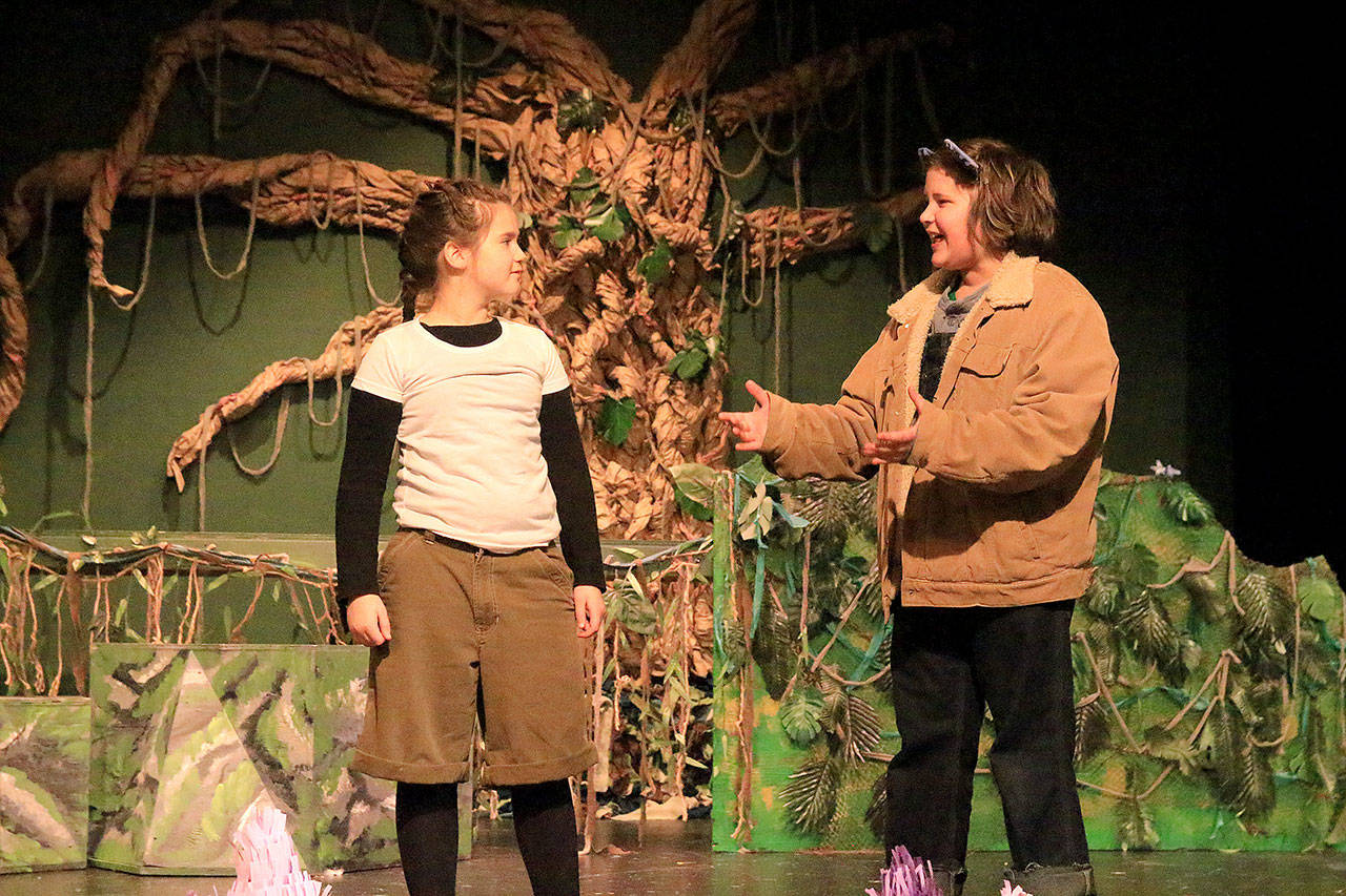 Mowgli (played by June Murray) and Baloo (Corin Boyd) begin their song, The Bear Necessities.