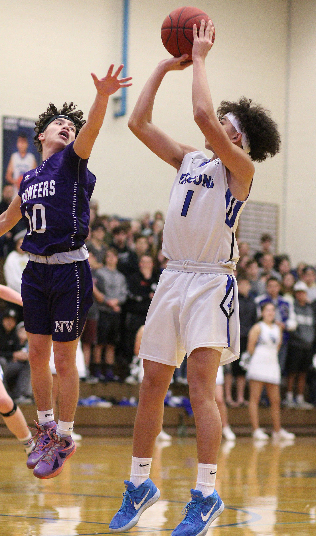 Jacob Ng puts up a jumper. (Photo by Steve Smith)