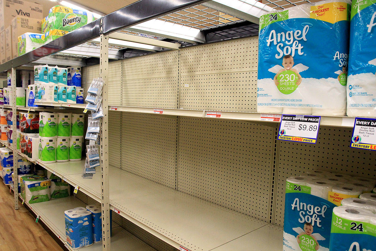 Photo by Kira Erickson/Whidbey News Group                                A desolate shelf of toilet paper in the Goose Community Grocer on Thursday.