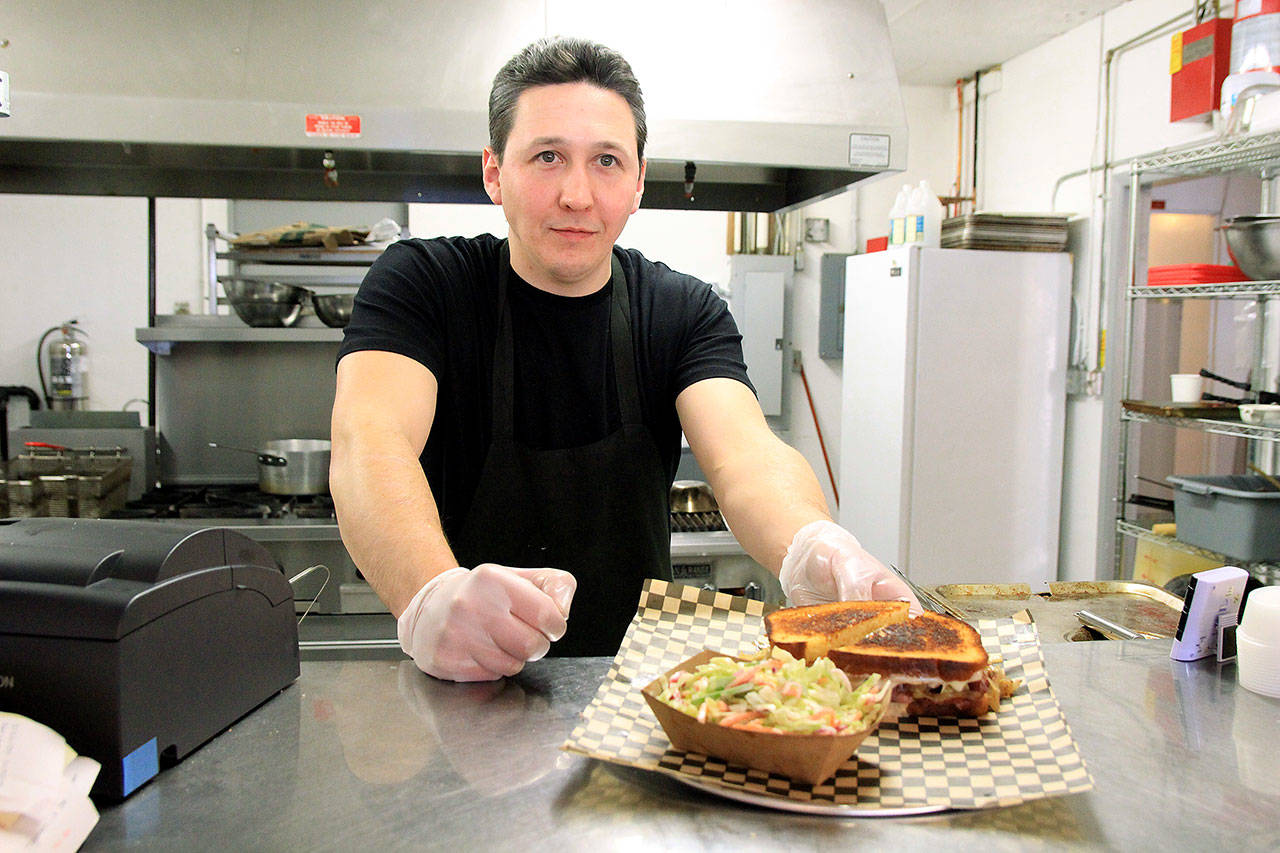 (Photo by Kira Erickson/Whidbey News Group)                                Co-owner Joe Wierzbowski is head chef for the Big W. The menu includes old favorites from the food truck but also burgers, a new addition.