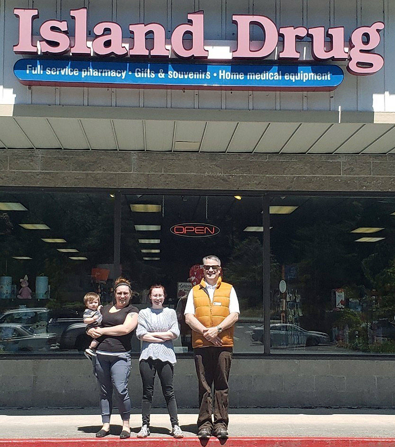 Photo provided                                Staff from Island Drug at Kens Korner are being temporarily relocated to the Oak Harbor store while efforts to secure a new South Whidbey location continue. From left to right: Store Manager and Pharmacy Technician Rachel Soto-Paulus, Pharmacy Technician Merissa Dahlman and Pharmacist Rich Russo.