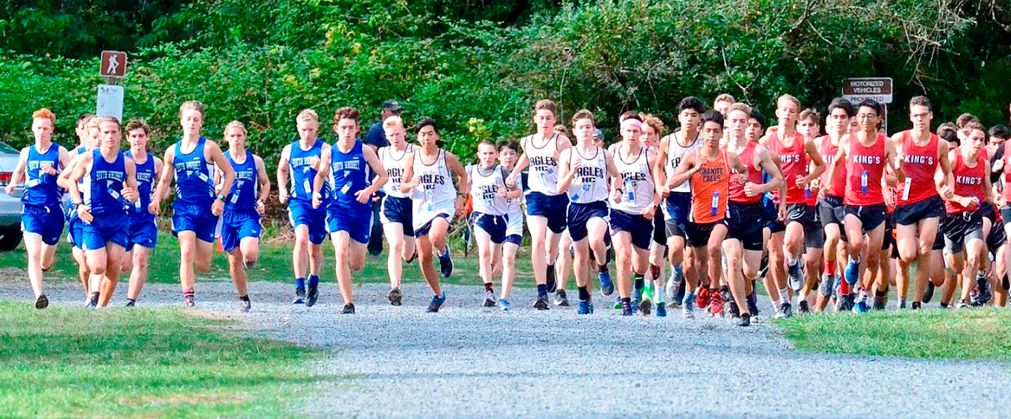 The South Whidbey High School boys cross country team, left, competes in a postseason meet last fall. The Falcons will have to wait until the spring to compete this school year. (File photo)