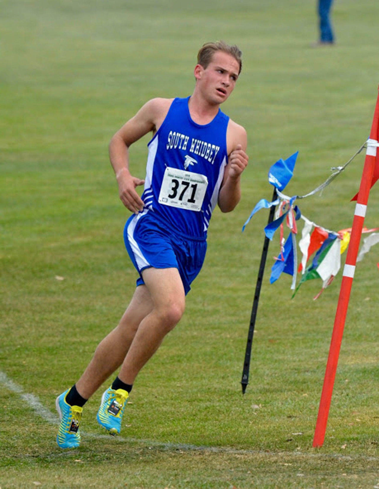 Michael Harwell competes in last year’s state cross country meet. (Photo by Karen Swegler)