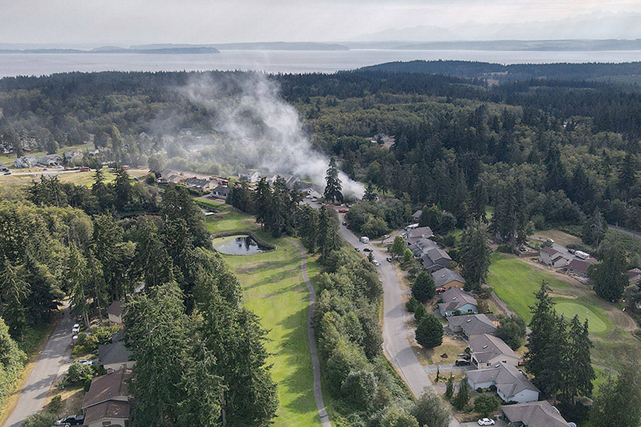 Using garden hoses, neighbors help fight fire