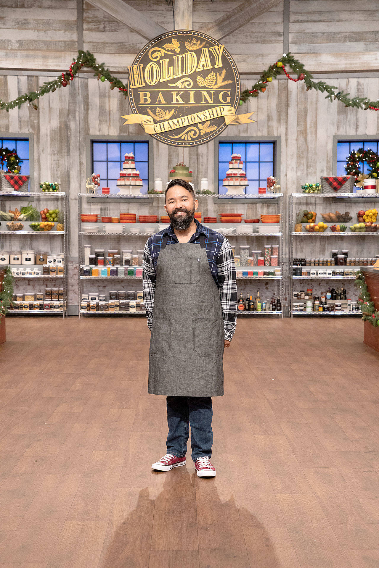 Photo courtesy of Food Network
Oak Harbor High School graduate Jonathan Peregrino stands on the set of TVs Holiday Baking Championship, premiering Nov. 2.
