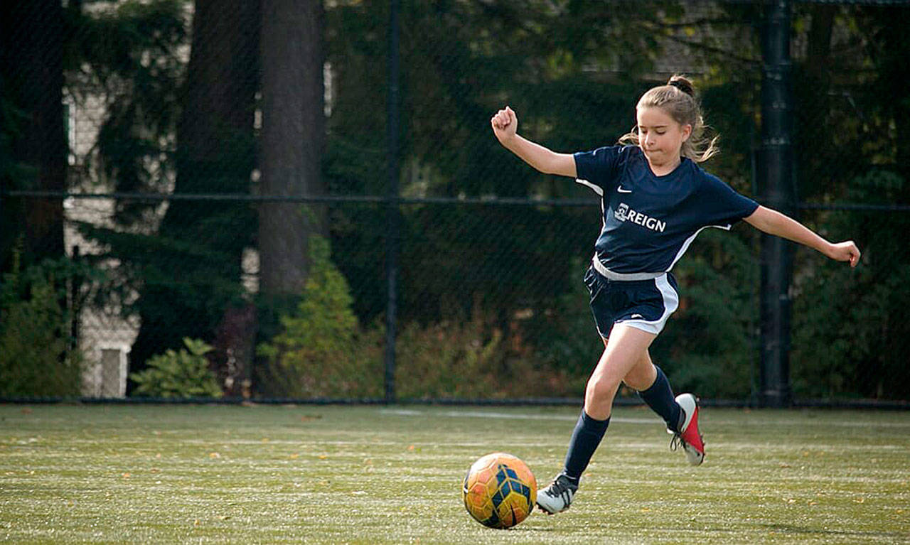 A South Whidbey youth soccer player advances the ball in a past game. (Photo provided)