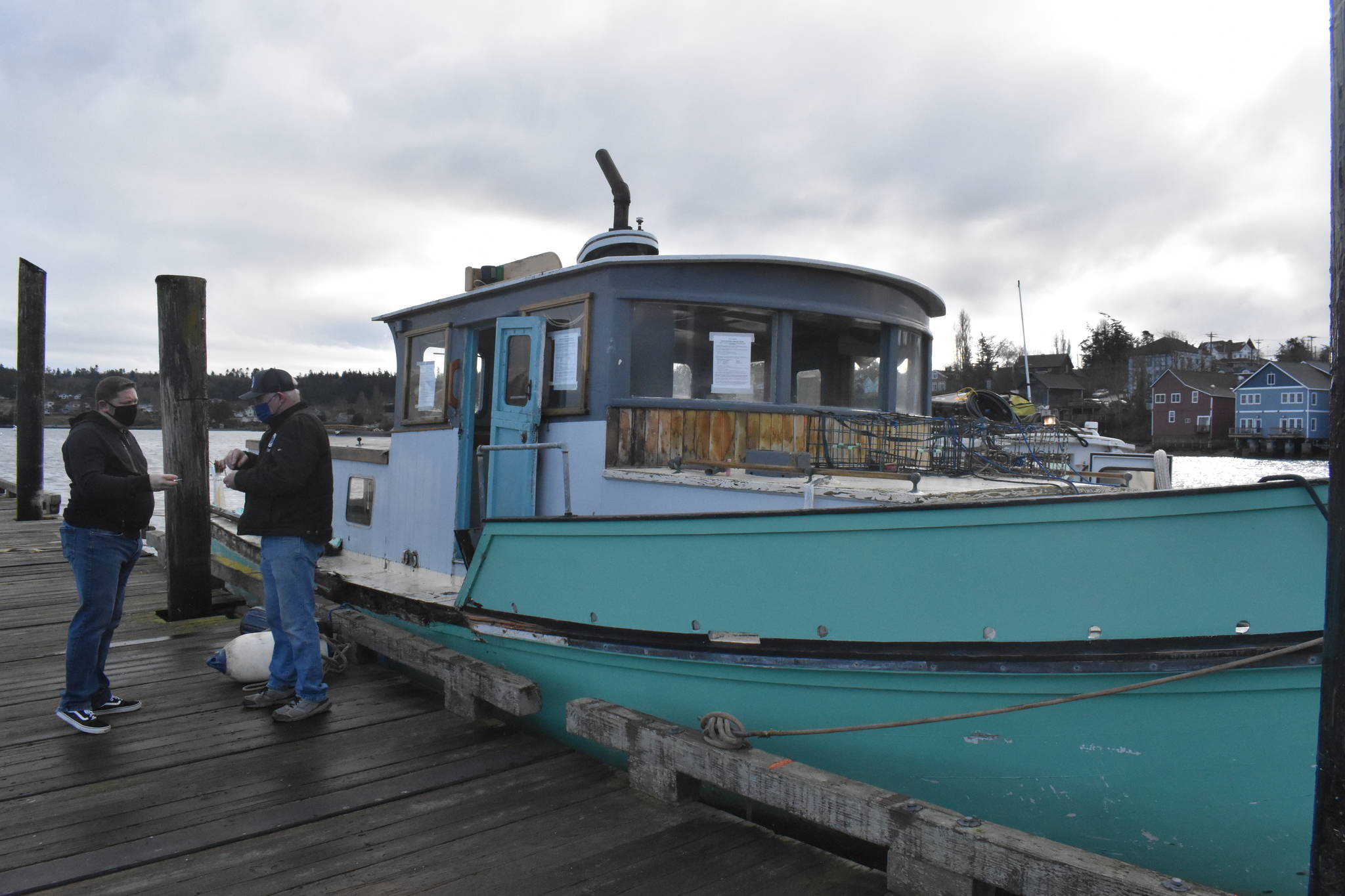 The <em>Platypus</em>, an abandoned boat that has been sitting at the Coupeville Wharf, has finally been hauled away. People from all over the country reached out to the Port of Coupeville with interest in the boat, but none of their plans came to fruition. Photo by Emily Gilbert/Whidbey News-Times