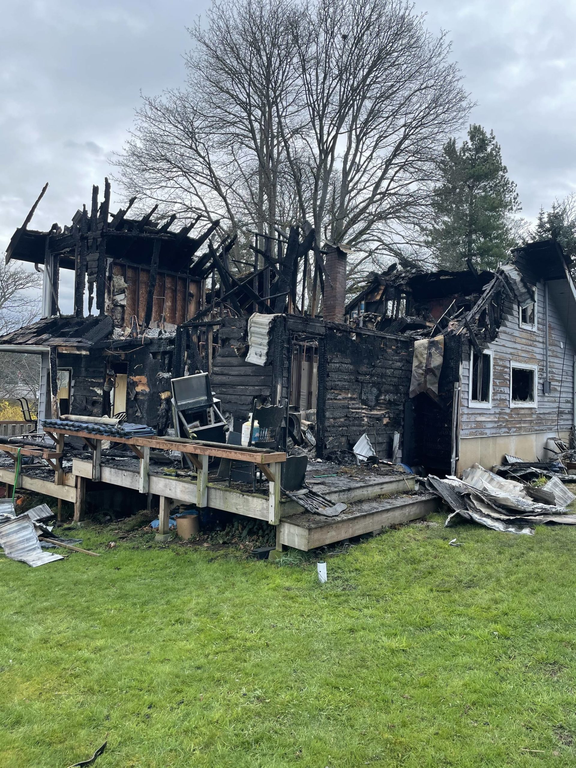 Photo by Seth Eckert
A fire devastated a Diamond Way residence early Wednesday morning. All that remains is the garage.