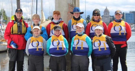 Members of the Oak Harbor High School Sailing team are, from left to right: Top row, coach Shawn O’Connor, Liam Chapman (‘22), Ryan Metz (‘22), Ben Servatius (‘22), Thomas Buys (‘22), Andrew Buys (‘21). Bottom row, Emelia Boilek (‘22), Anna Servatius (‘24), Allison Bailey (‘23), Shelby Lang (‘23). Photo by Denise Buys