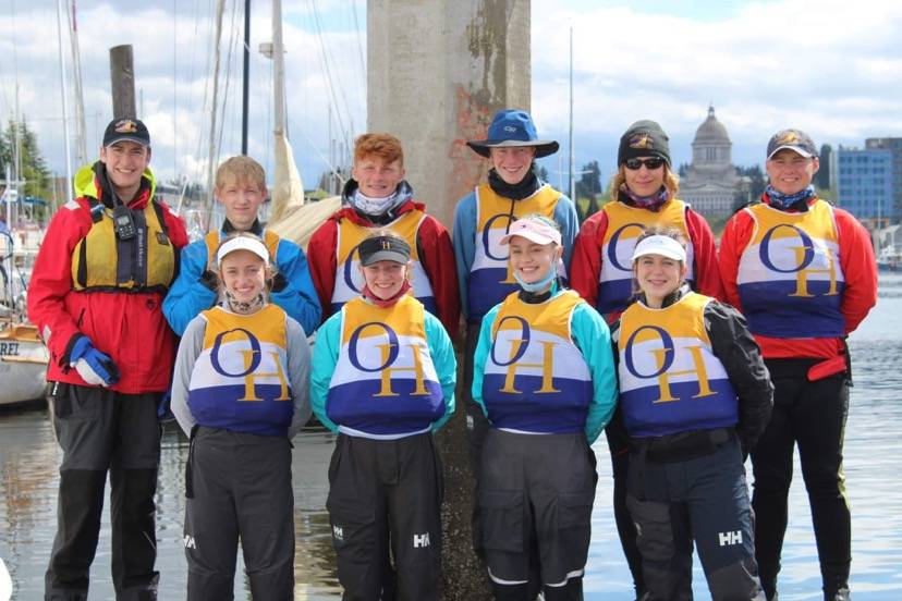 Members of the Oak Harbor High School Sailing team are, from left to right: Top row, coach Shawn OConnor, Liam Chapman (22), Ryan Metz (22), Ben Servatius (22), Thomas Buys (22), Andrew Buys (21). Bottom row, Emelia Boilek (22), Anna Servatius (24), Allison Bailey (23), Shelby Lang (23). Photo by Denise Buys