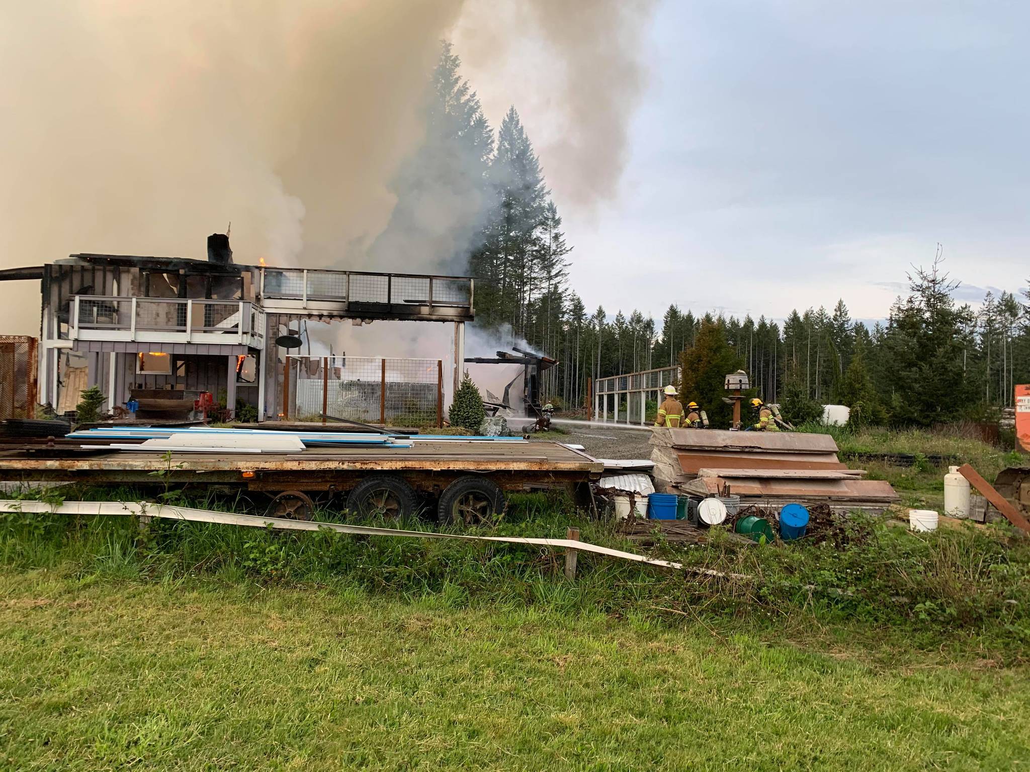 South Whidbey Fire/EMS responded around 7:29 p.m. Wednesday evening to a structure fire near Venturi Way. (Photo by Heather Mayhugh)