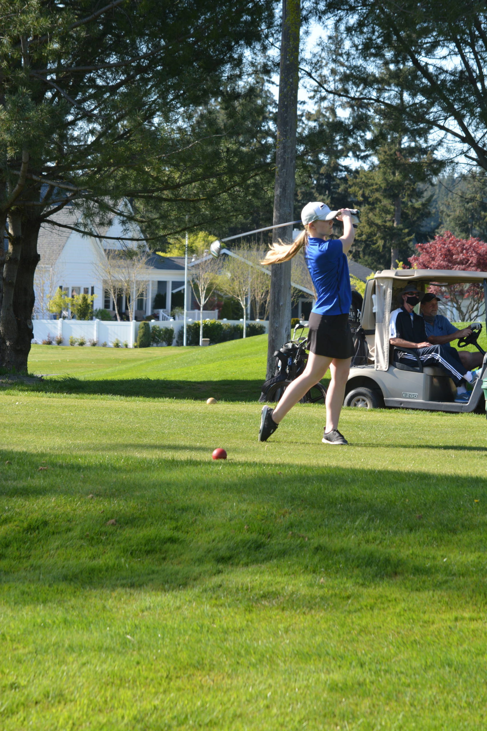 Photo provided
Junior Caitlin Sullivan tees off at the Emerald Sound Conference Championships May 12.