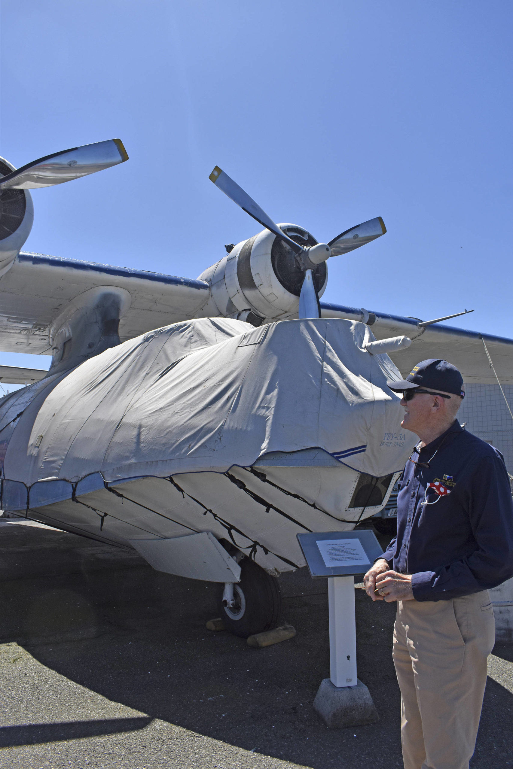 Pacific Northwest Naval Air Museum President Wil Shellenberger is hoping to find more volunteer docents so the museum can show off the PBY-5A Catalina aircraft’s interior to the public. Photo by Emily Gilbert/Whidbey News-Times.