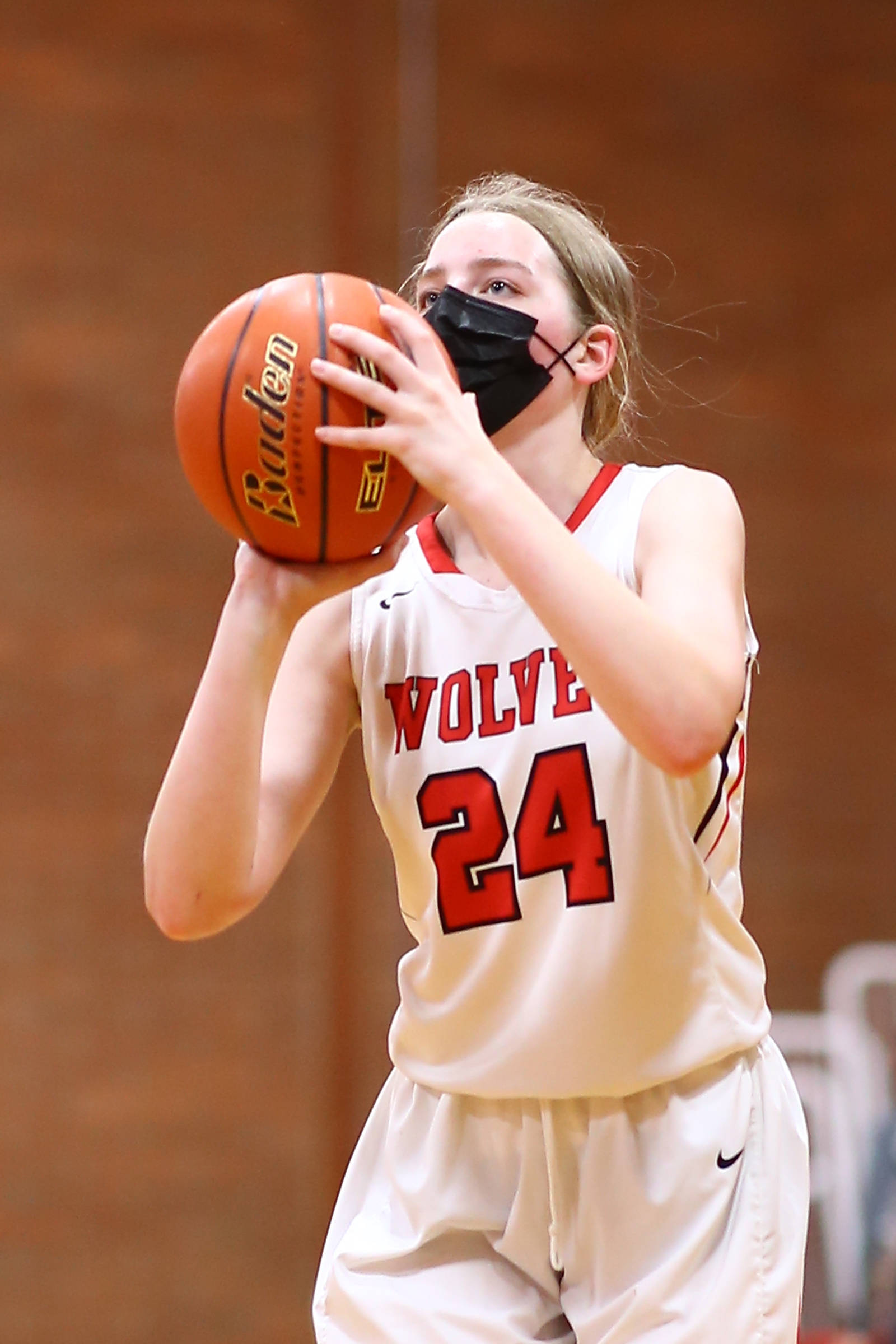 Savina Wells takes a shot in a Coupeville High School basketball game against Orcas Island High School May 20. (Photo by John Fisken/Whidbey News-Times)
