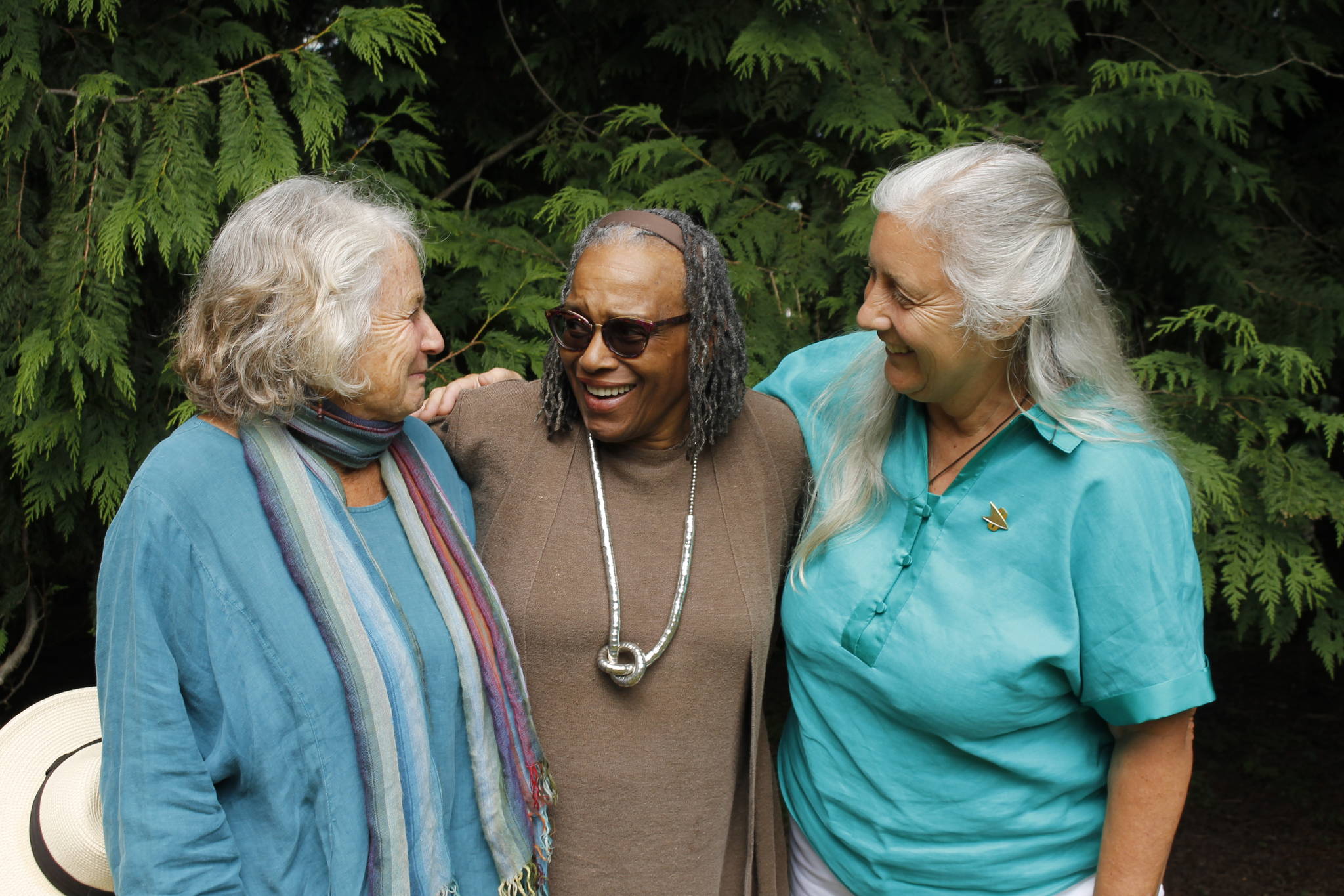 From left to right: Gail Fleming, Harolynne Bobis and Rhonda Salerno all wear different hats as members of Langley citizen-led committees. The three women, who are currently running for positions on the city council, announced this week that they are planning to run as a slate. (Photo by Kira Erickson/South Whidbey Record)