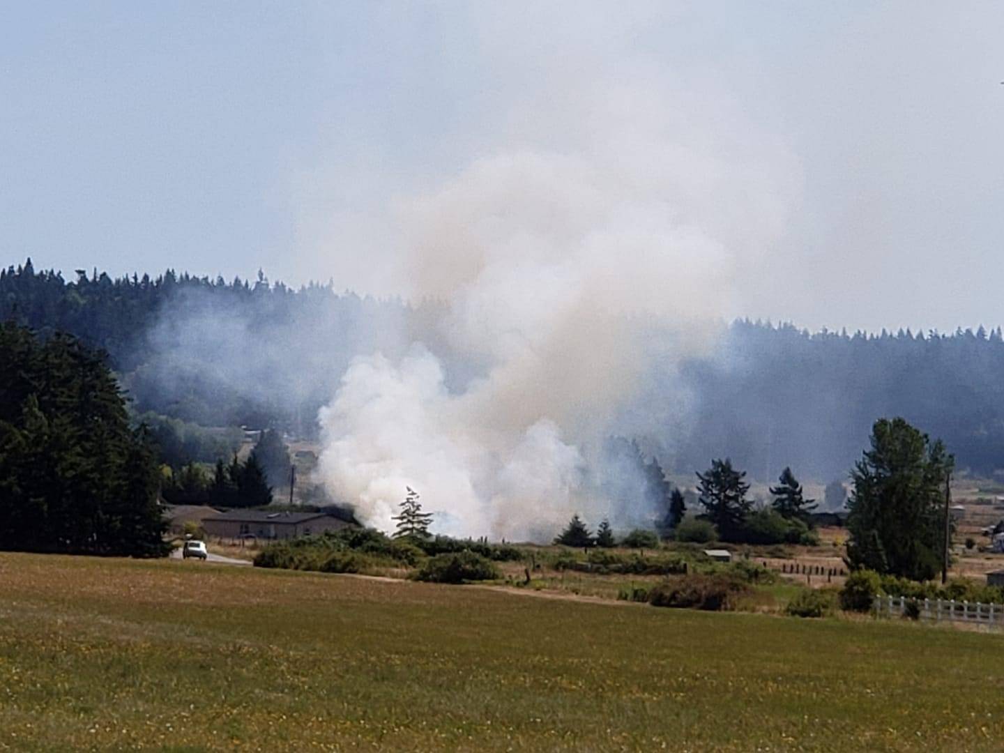 Photo by Sara Hogarth
North Whidbey Fire and Rescue called Navy firefighters for help to extinguish a brush fire near Green Valley Road last Friday.