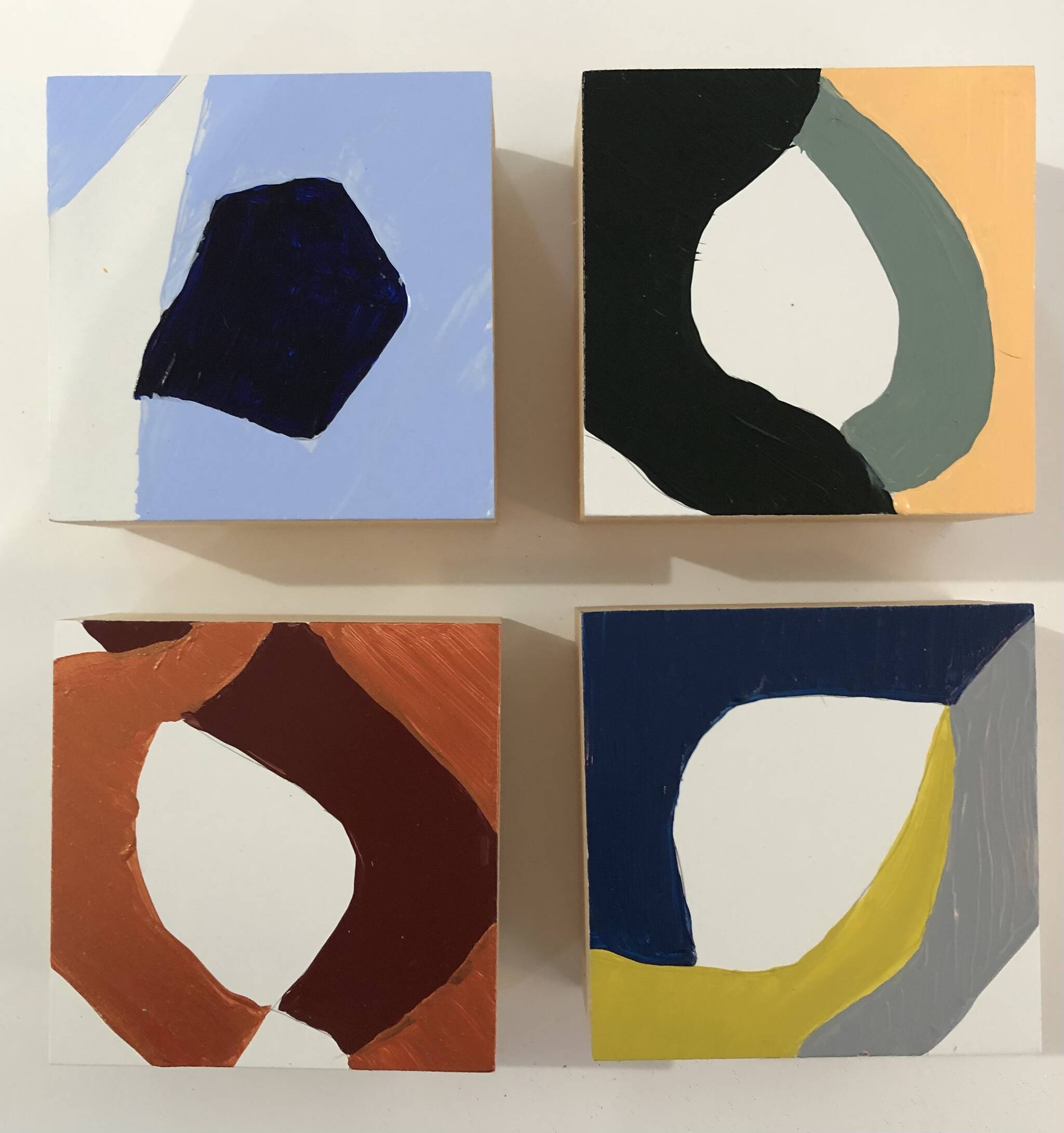 A series of small square abstract paintings by Barbara Mosher will be available for sale at the upcoming Whidbey Art Market. (Photo provided)