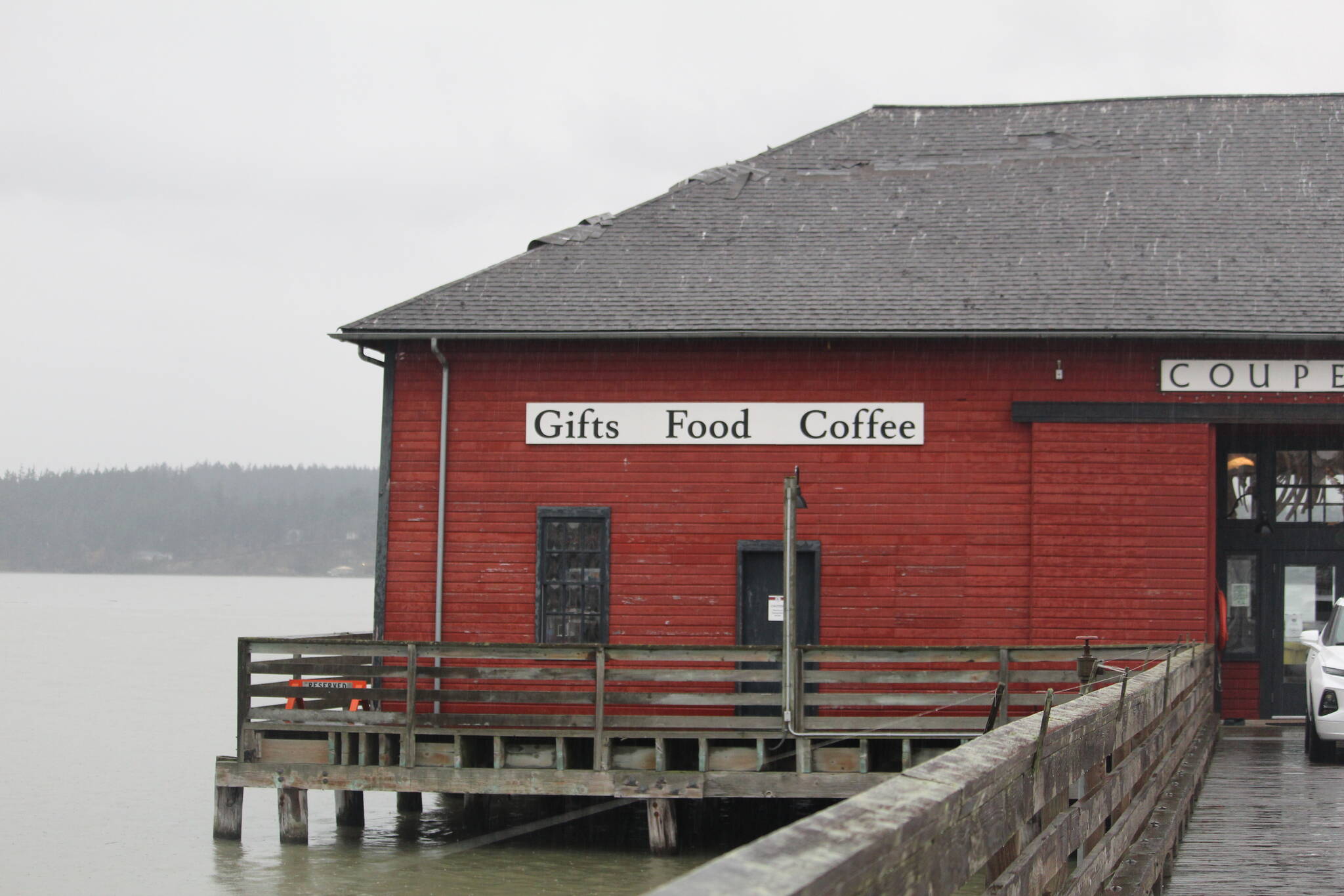 Photos by Karina Andrew/Whidbey News-Times
Above, the Coupeville Wharf lost a quarter of its shingles and sustained other damage during Mondays wind storm.