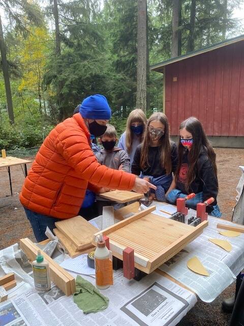 Photo provided
Fourth grade students at Whidbey Island Waldorf School construct bat houses for local bat populations to roost in.