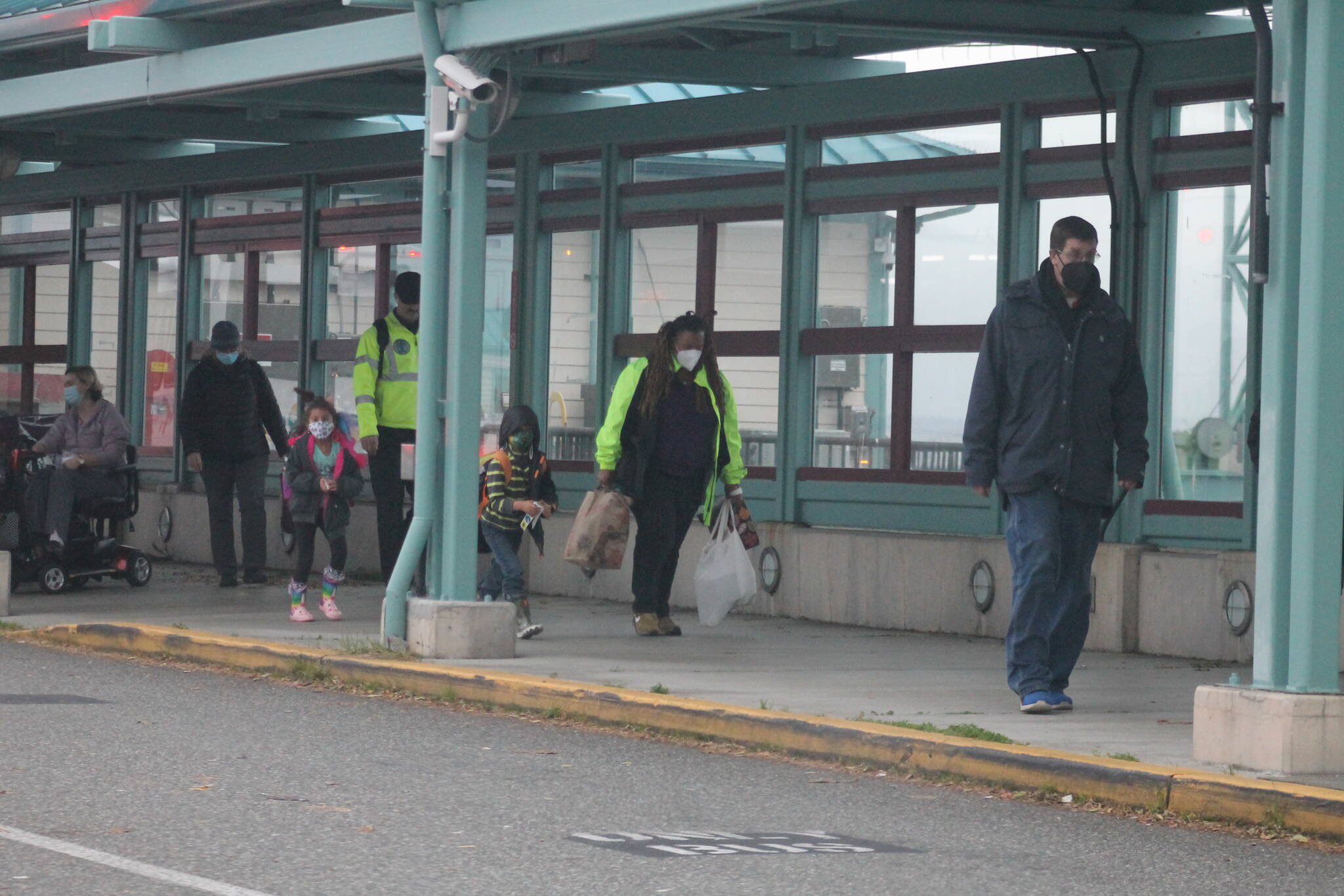 Photo by Kira Erickson/South Whidbey Record
Walk-on passengers that have disembarked the ferry at the Clinton terminal head away from the boat.