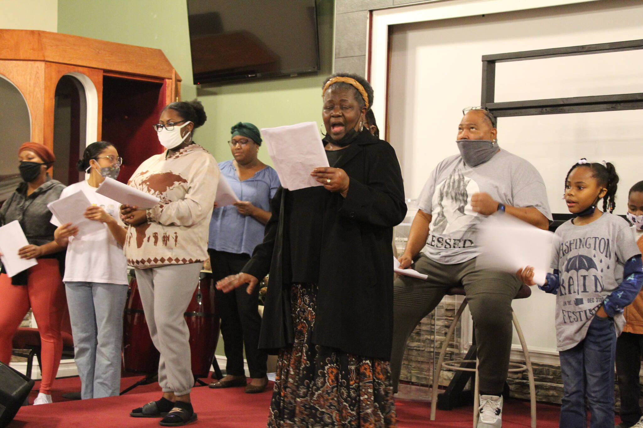 Choir members rehearse for the upcoming celebration of Martin Luther King Jr. at Mission Ministry Faith Center in Oak Harbor. (Photo by Karina Andrew/Whidbey News-Times)