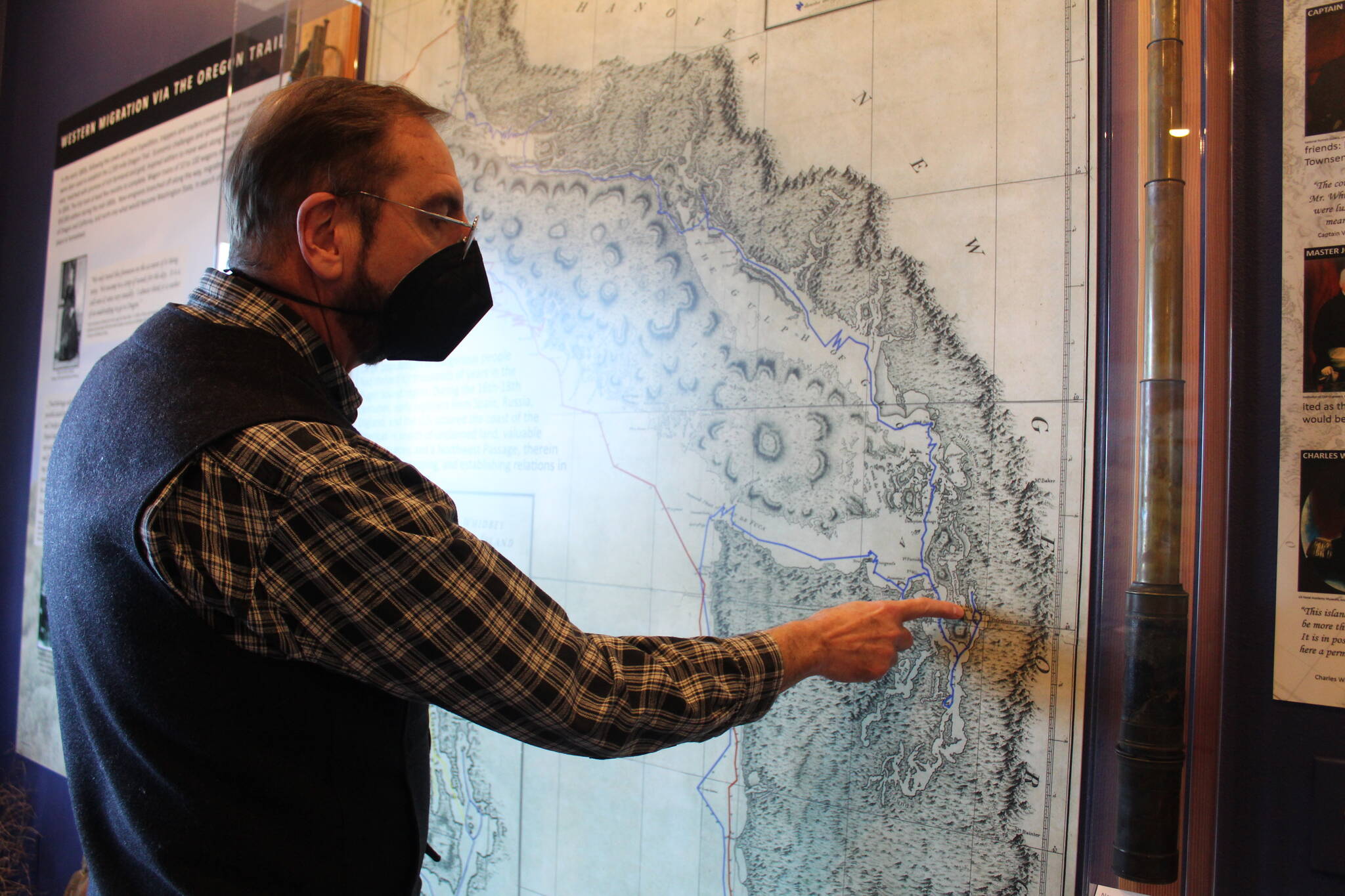 Photo by Karina Andrew/Whidbey News-Times
Rick Castellano points out routes taken by European explorers on a rendering of an early map of the Puget Sound area.